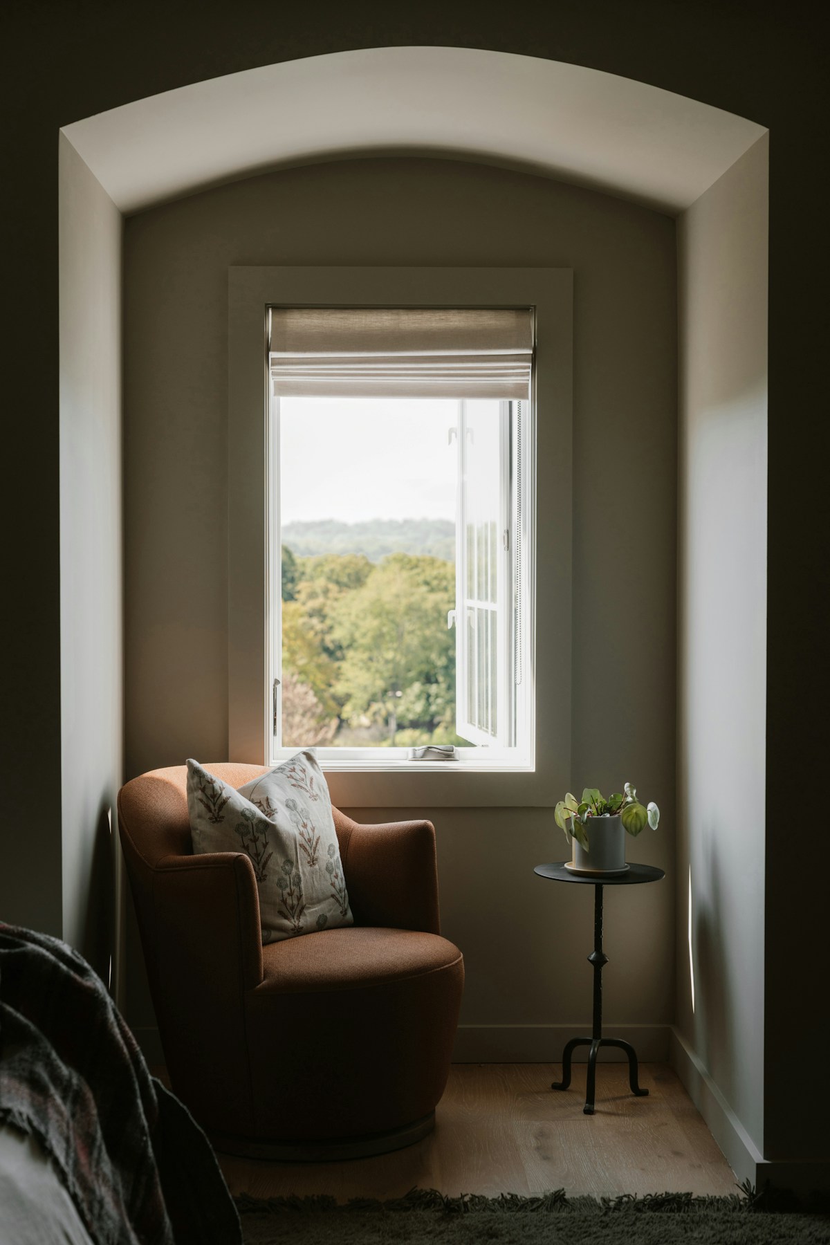 The Sunday Chair beside a sunlit window
